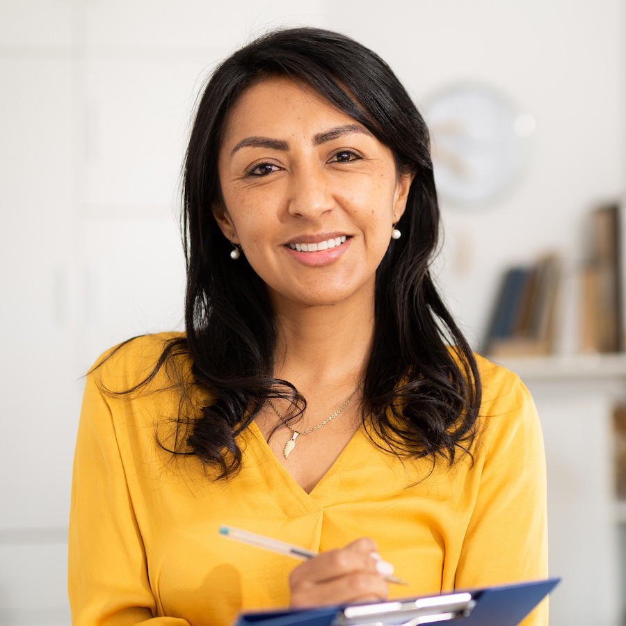 Woman holding a clipboard